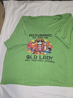 Green Graphic Women's Tee with Colorful Hippie Design